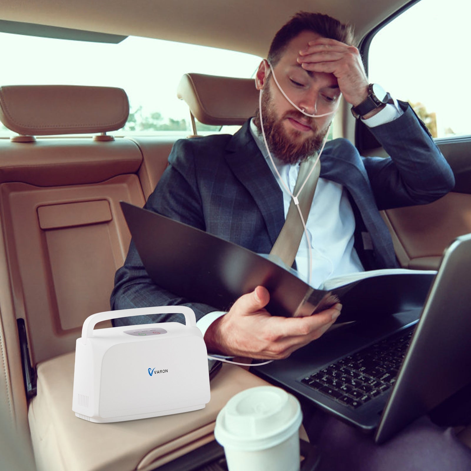 User working while using the lightweight VARON VL-1 portable oxygen concentrator, ideal for mobility and daily productivity.